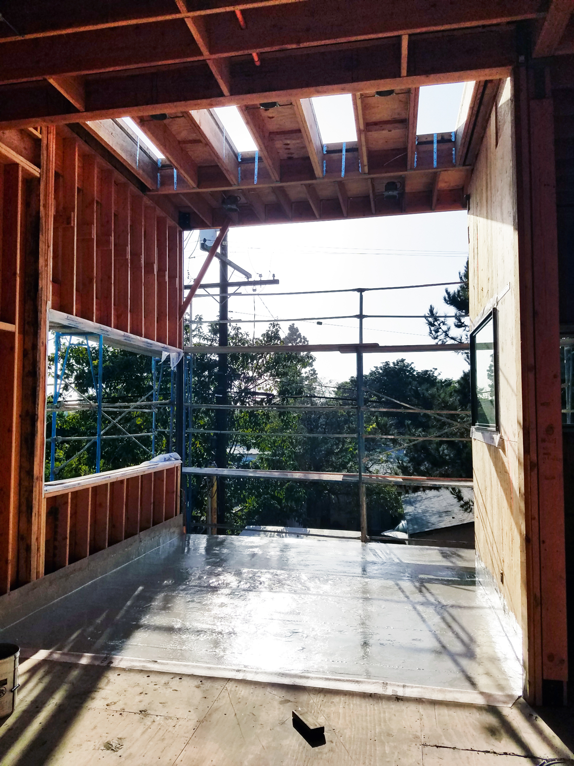 A construction photo of house. Wood framing.
