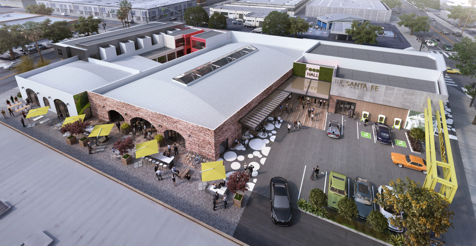 A perspective view of the commercial complex. Brick building at the center. Parking lot facing the street. Outdoor dining area at the alley.